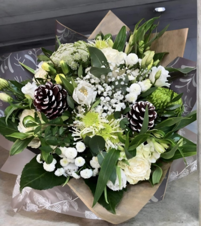Jack Frost White Handtied - Escape into a winter wonderland with our 'Jack Frost White Handtied' bouquet. Radiating crisp whites and lush greens, it's a perfect gift to captivate hearts.