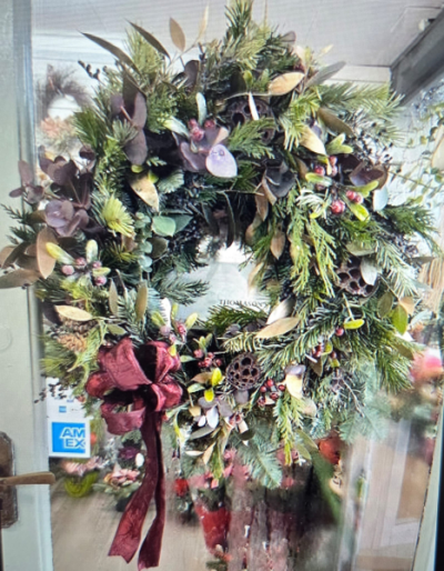 Christmas Wreath Large - Capture the festive spirit with our 'Christmas Wreath Large.' Lush greens and rich burgundy accents create a warm, expertly crafted by Four Seasons Florist Ltd, Wigan.